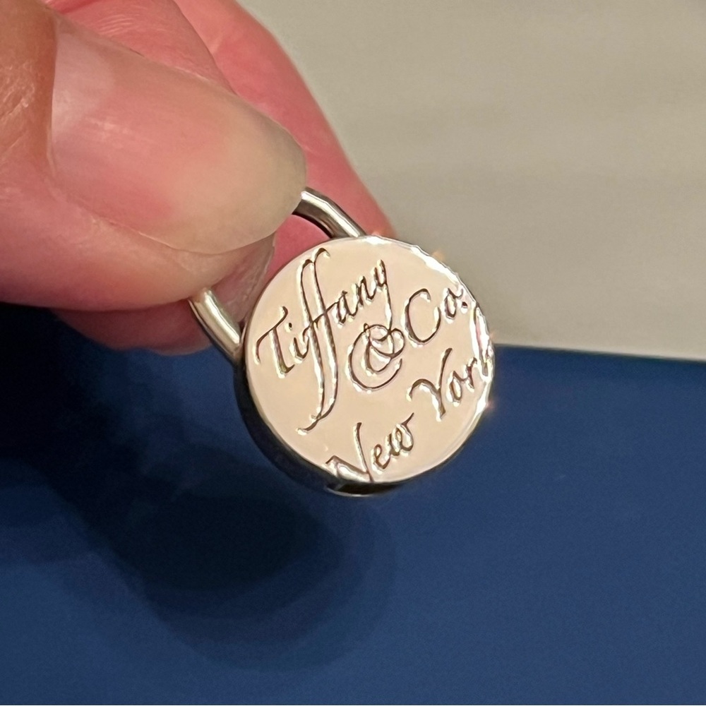 ✨✨✨SOLD✨✨✨ Tiffany & Co. New York Notes Silver Padlock Charm Pendant